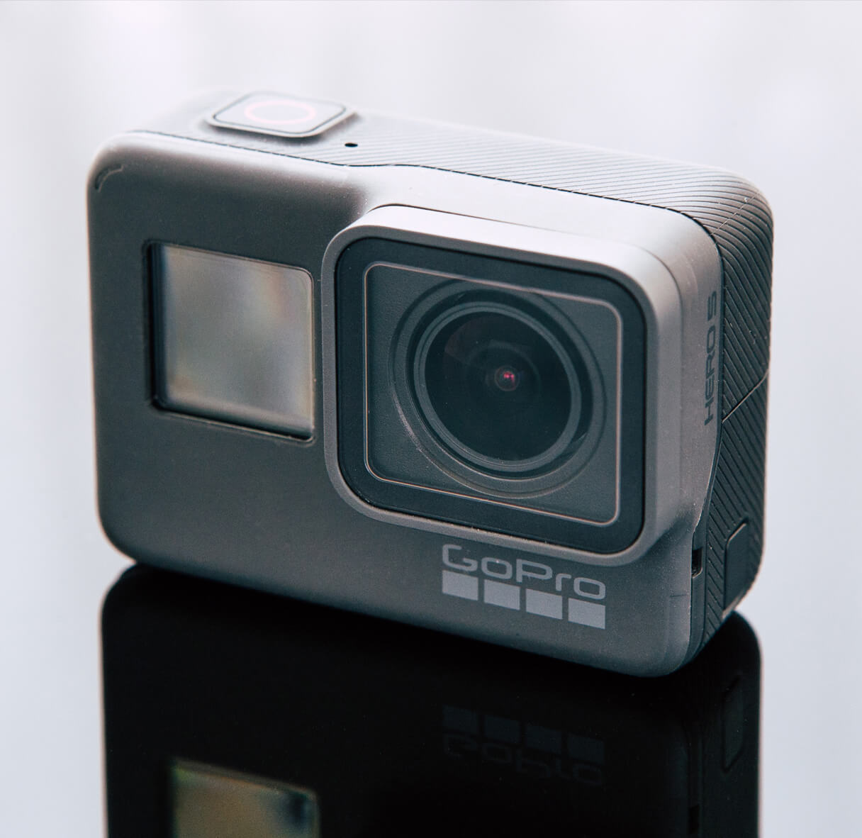 SA Mercantile Investigation Services. Debt Collection page image of a GoPro camera sitting on a table.